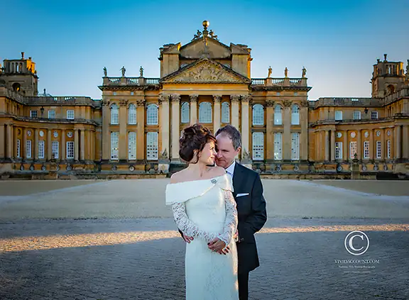 Tunbridge wells couple posing together in front of Blenheim Palace for winter wedding portraits