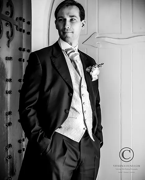 Tunbridge wells groom in morning suit posing in a semi formal for a wedding portrait