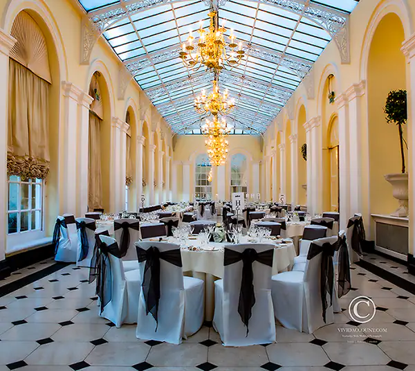 wedding breakfast featuring a black lace theme laid out in the Orangery at Blenheim Palace